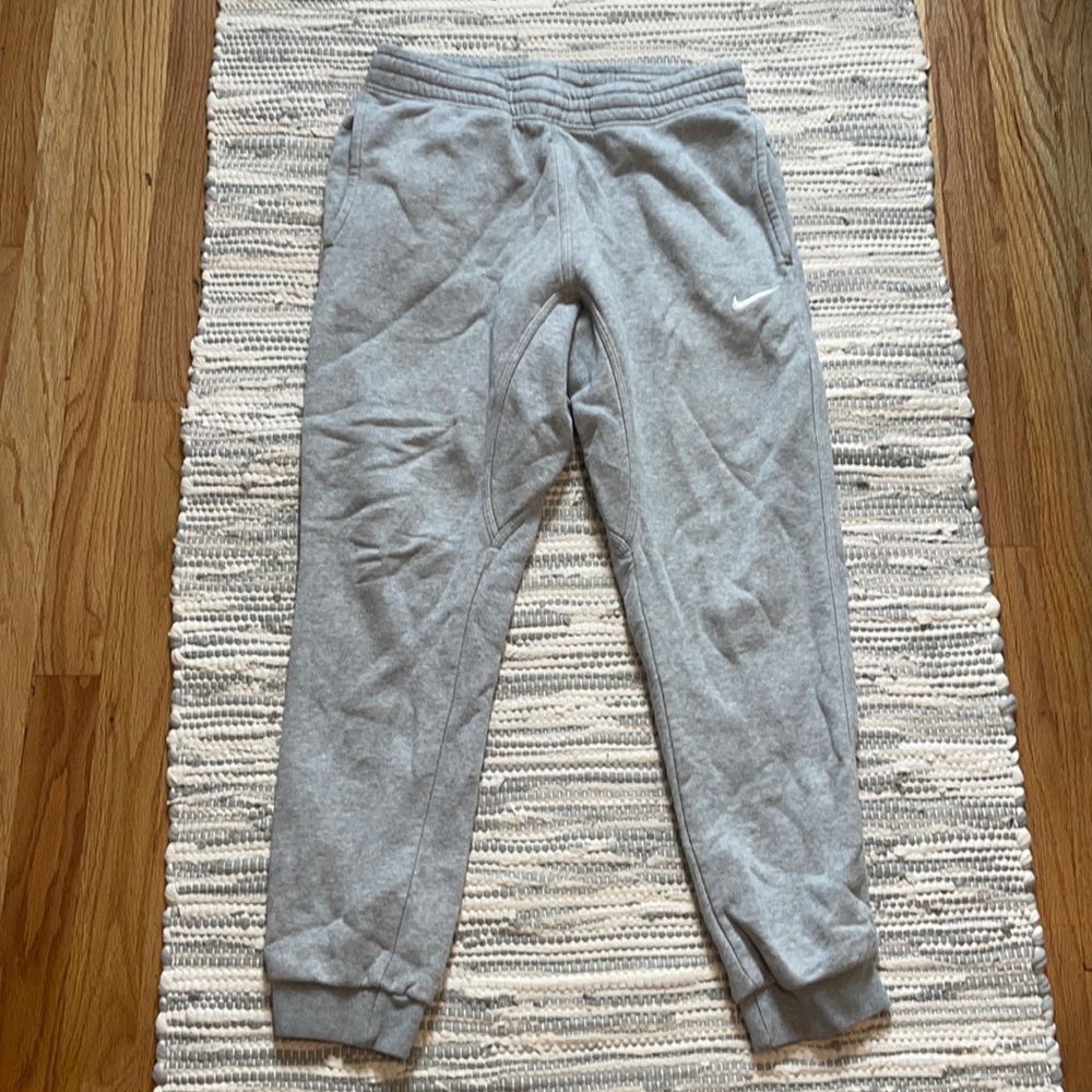 Nike jogger pants. Cuffed at the bottom